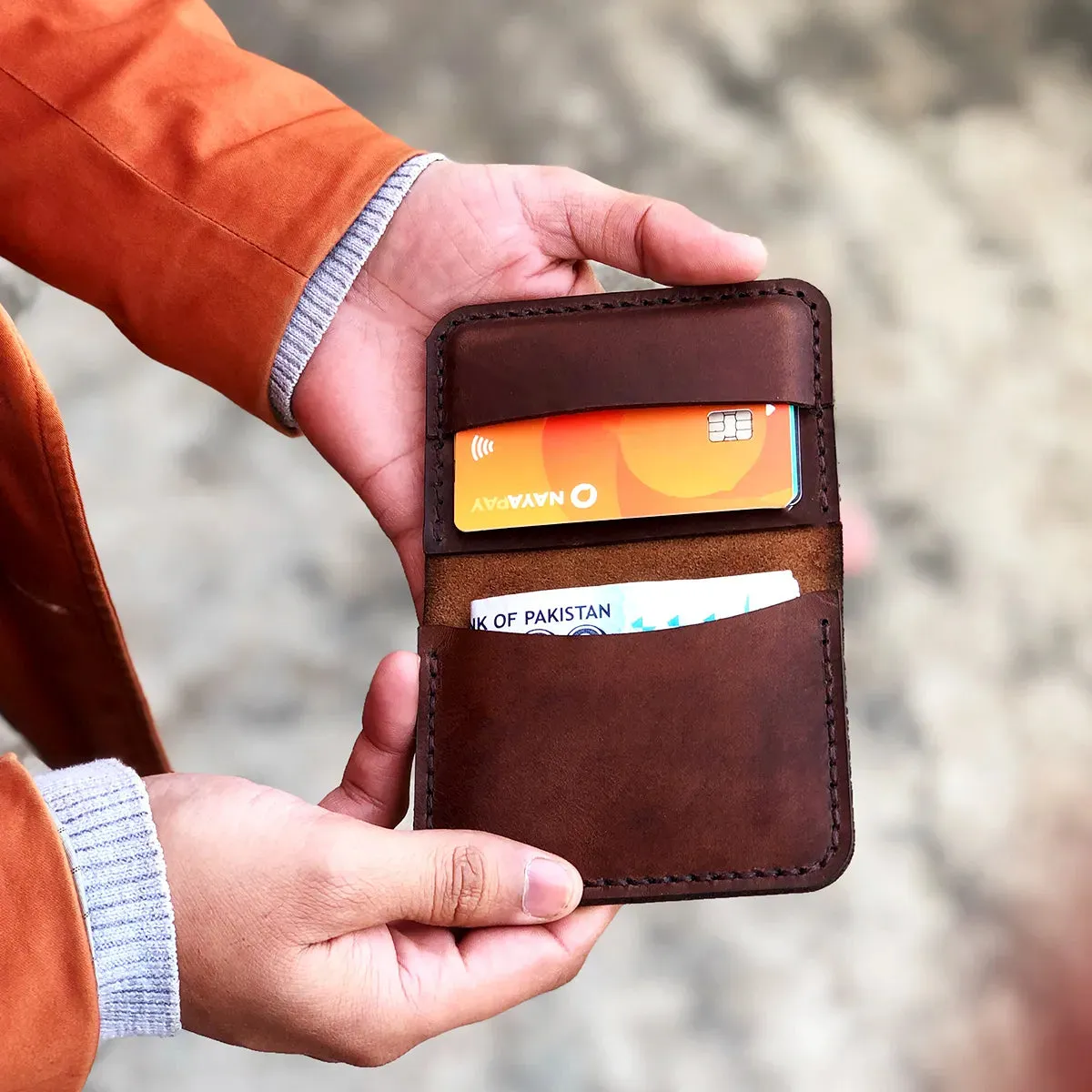 The Vertical Convenience: A Leather Bifold Wallet